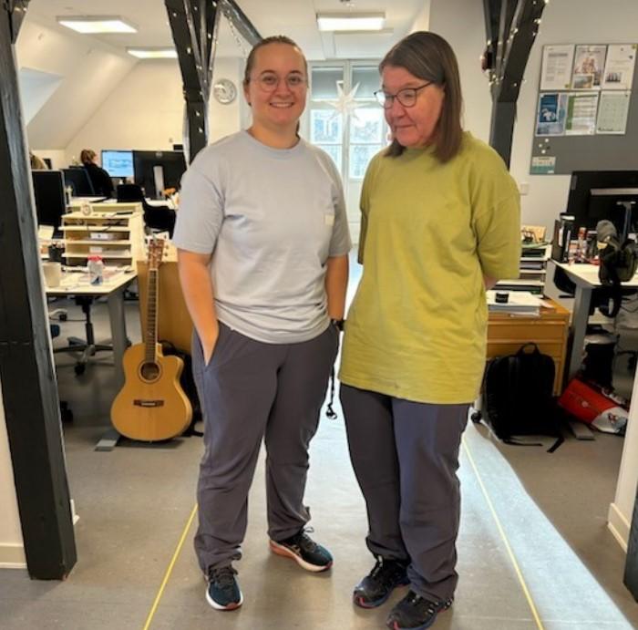 Photo of 2 persons wearing the uniforms