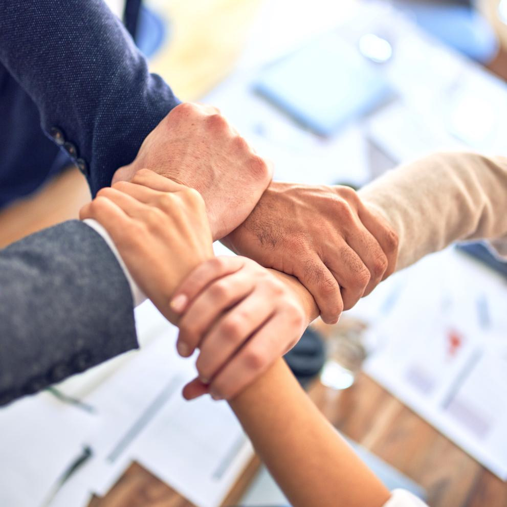 image of people holding hands
